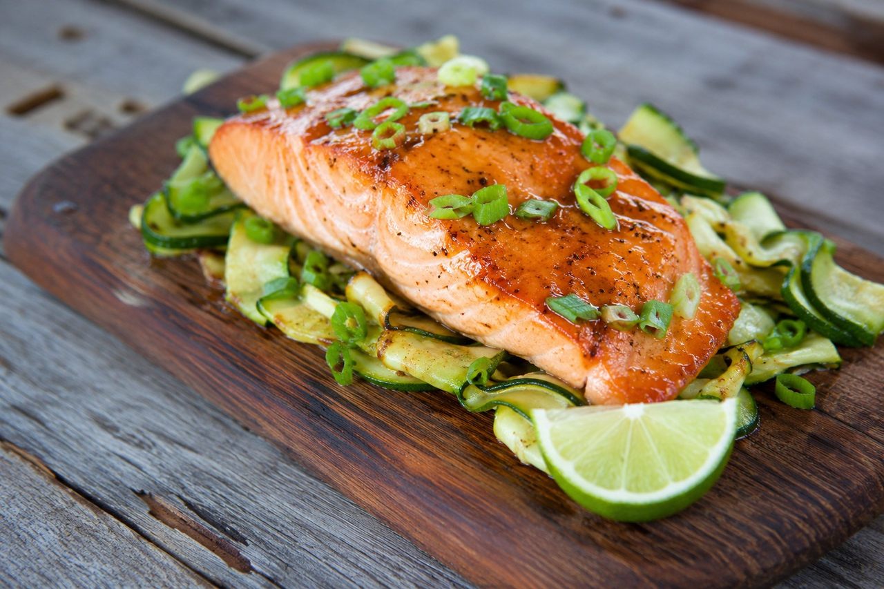 AIP ginger-lime baked salmon over zucchini with coconut aminos marinade