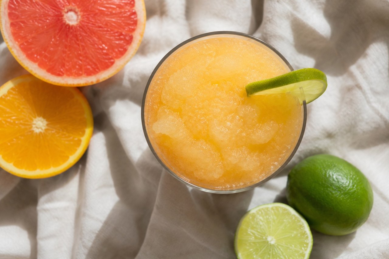 alcohol-free frozen citrus margarita slush, an AIP-friendly mocktail for elimination-phase celebrations