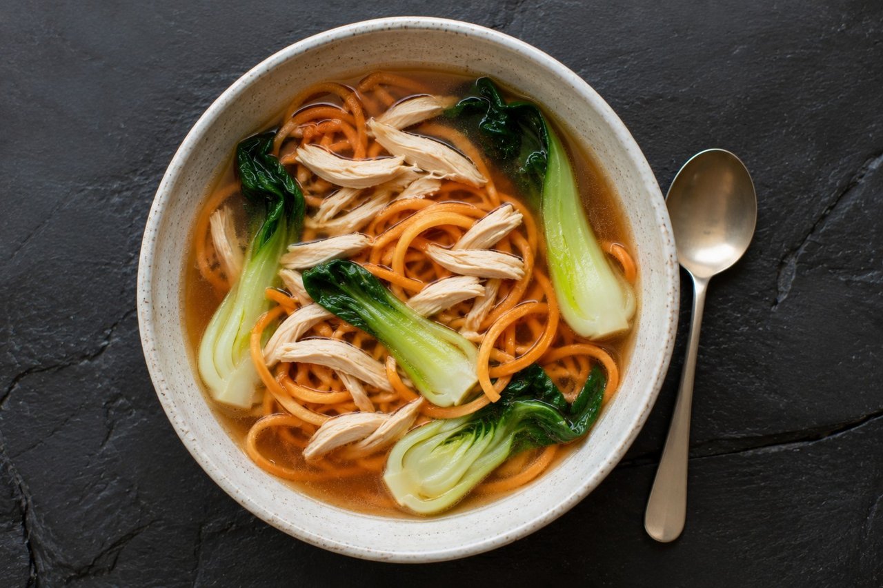 AIP cup of noodles rebuilt with sweet potato noodles, clean broth, and permitted aromatics in place of grain ramen