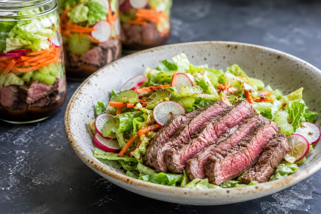seared New York strip layered into Mason jars with a balsamic anchovy dressing and crisp vegetables, make-ahead salads for the week