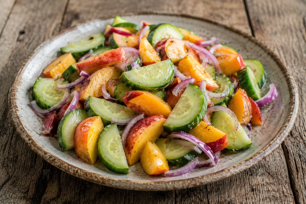 cucumber and peach salad with olive oil and apple cider vinegar dressing